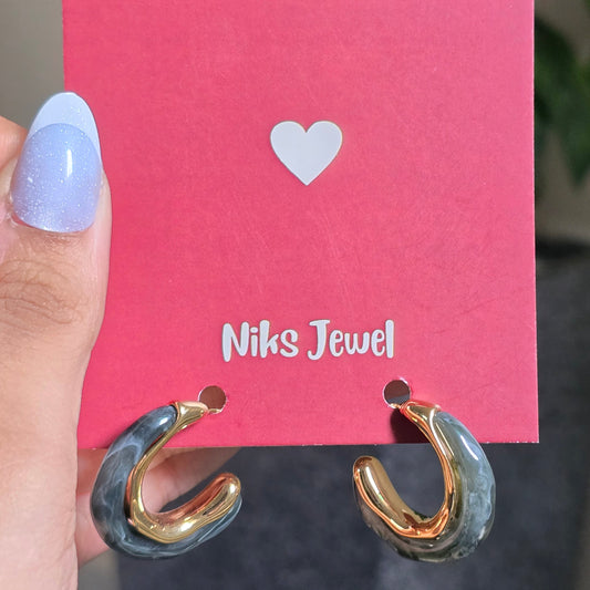 Two-Tone Marble Hoop Earrings.
