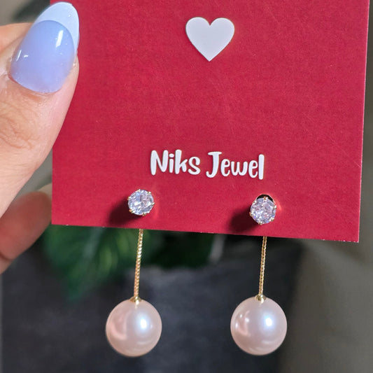 Long Chain Pearl Drop Earrings.