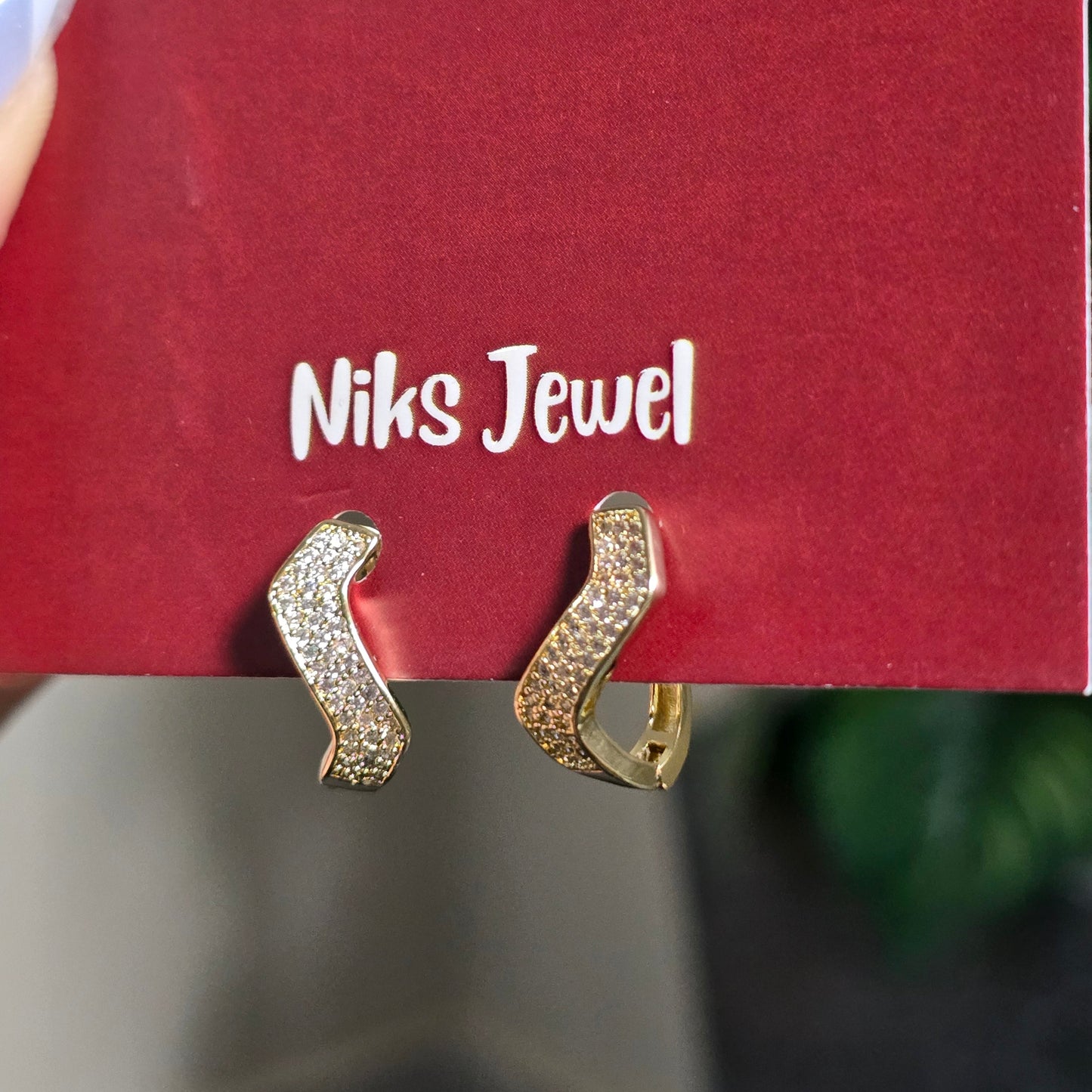 Gold-Tone CZ Wave Hoop Earrings.