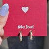 Gold-Tone CZ Huggie Hoop Earrings.