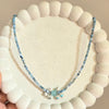 Blue-Grey Beaded Necklace with Charm Cluster Pendant.