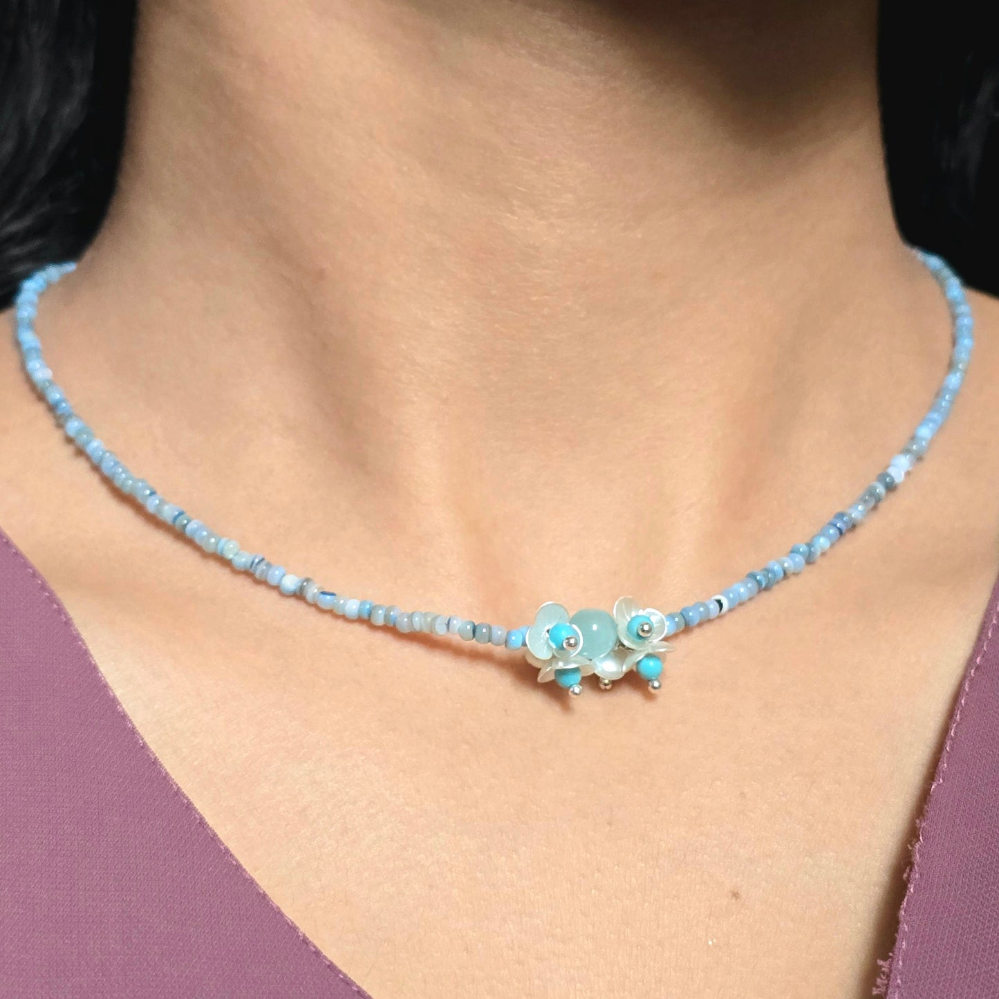 Blue-Grey Beaded Necklace with Charm Cluster Pendant.