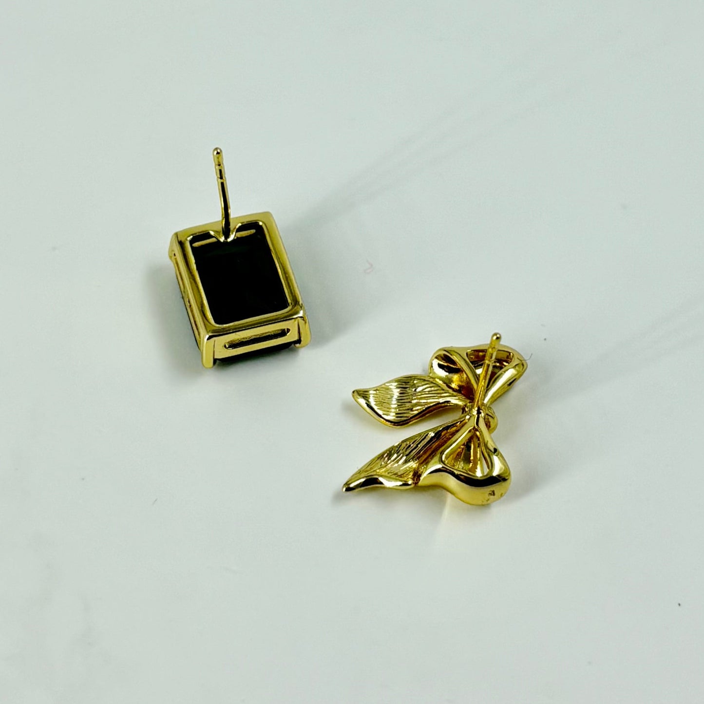 Mismatched Bow & Green Stone Studs