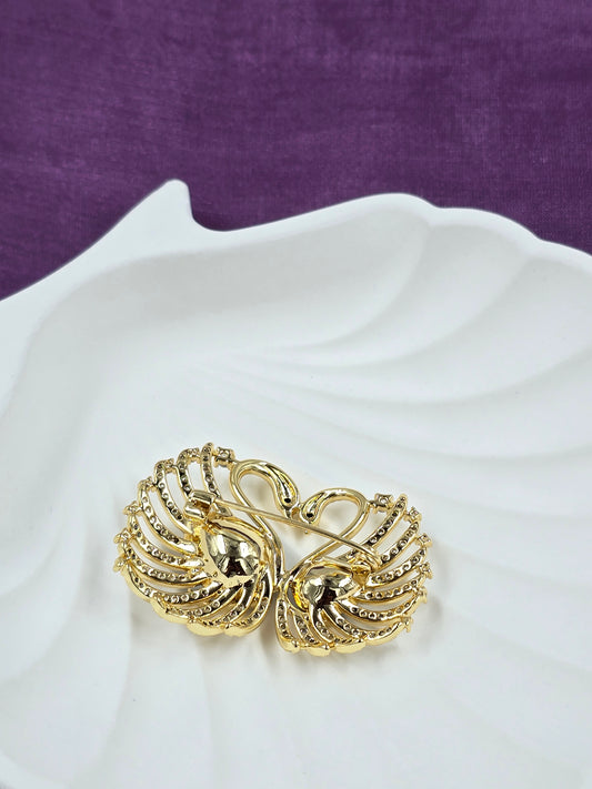 Loving swans brooch