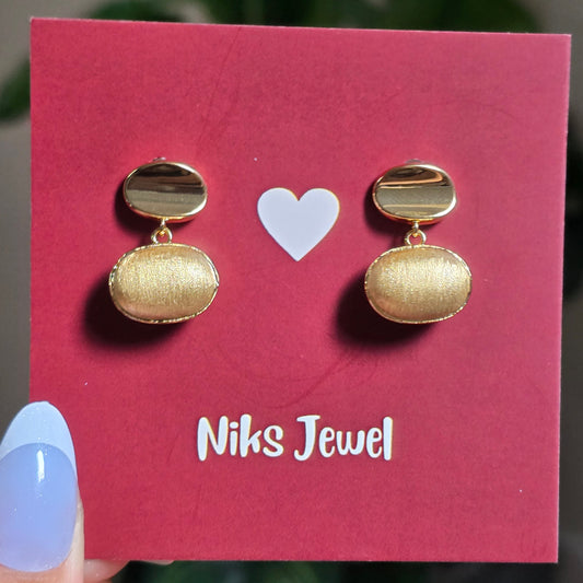 Dual-Finish Oval Drop Earrings.