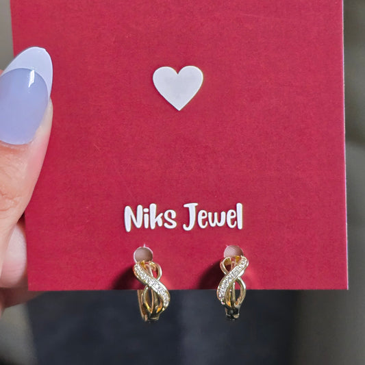 Infinity Crystal Twist Hoop Earrings.
