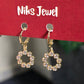 Gold-Tone Circular Crystal Drop Earrings.