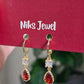 Emerald Green Teardrop Crystal Drop Earrings.