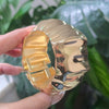 Gold-Plated Ribbed Wide Cuff Bangle.