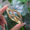 Gold-Plated Open Wave Twist Bangle.