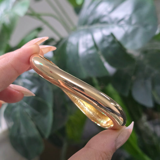 Gold-Plated Sleek Twist Bangle.