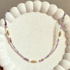 Amethyst Beaded Necklace with Gold and White Accents.