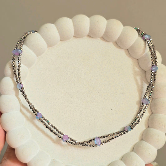 Double Strand Metallic Beaded Necklace with Iridescent Stone Accents.