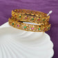 Elegant Gold-Toned Multicolour Stone Bangles In Temple