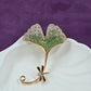 Gold-Tone Leaf Pin with Green and White Crystals