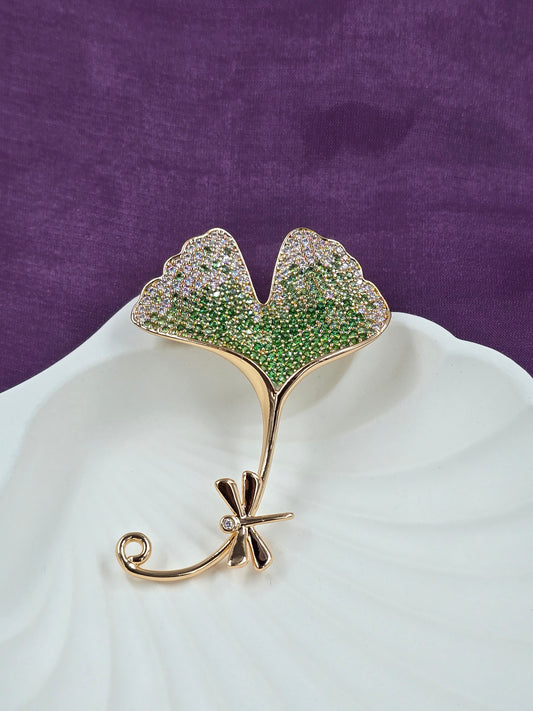 Gold-Tone Leaf Pin with Green and White Crystals