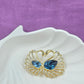 Loving swans brooch