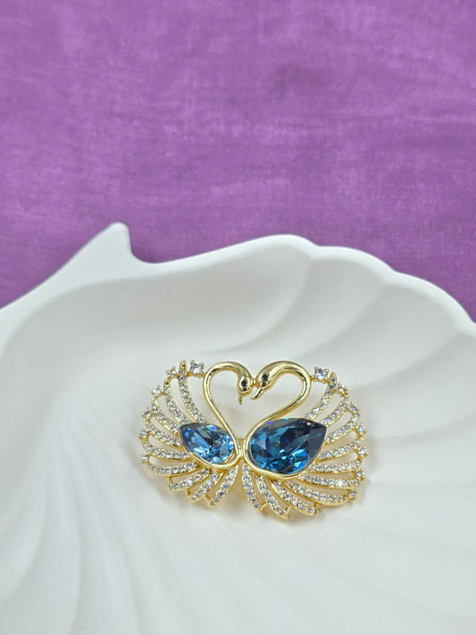 Loving swans brooch